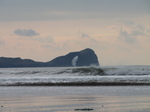 SX26317 Waves splashing from Worms head, Rhossilli beach.jpg